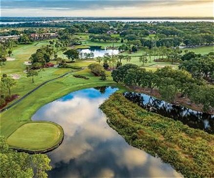 Aerial view of golf course loading=