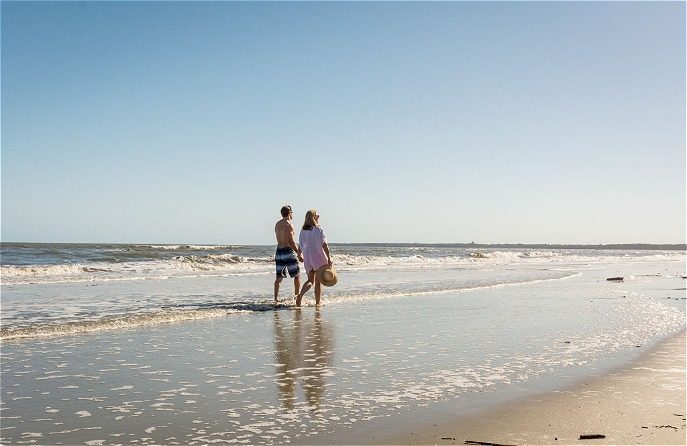 Couple walking on beach