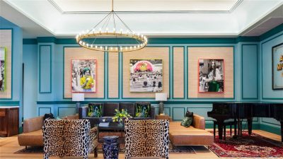 Hotel lobby with chairs and various artwork